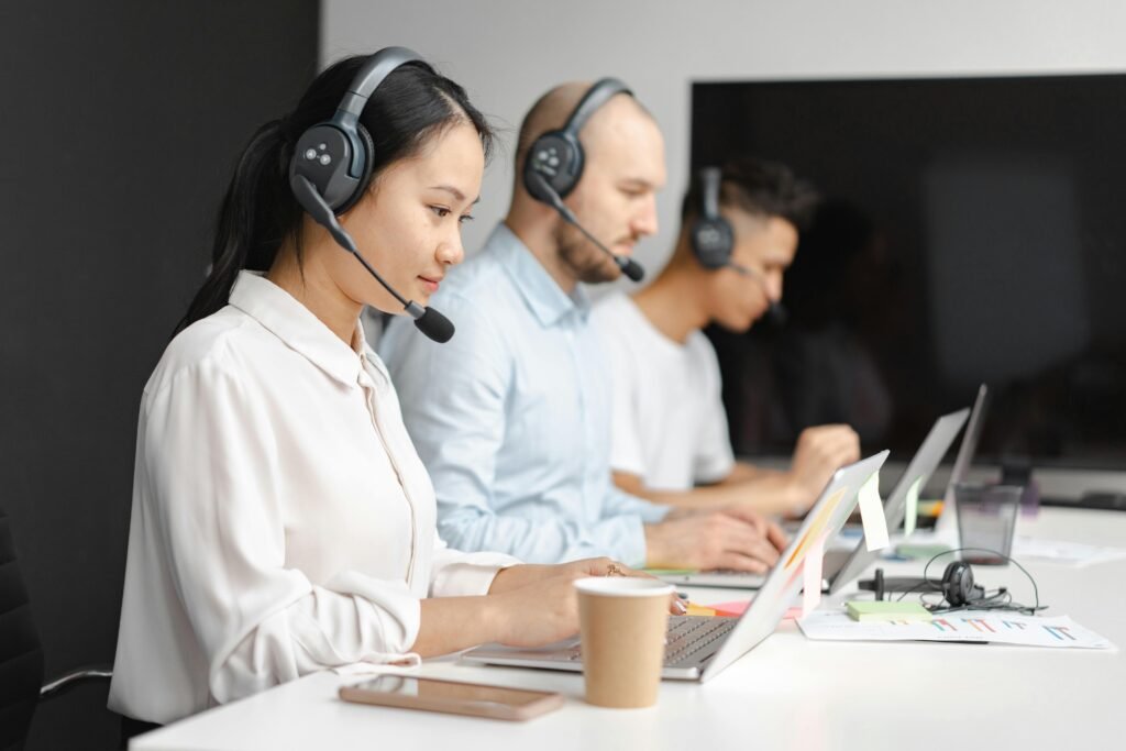 office workers sitting in a line working